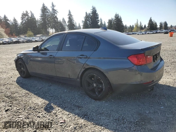2013 BMW 3 Series 328i xDrive with VIN WBA3B3C56DF530814, listed as a Copart auction lot 52820915 with 144,164 mi miles and Salvage Title. Bid and sale history available at carsss.com. Image 2.
