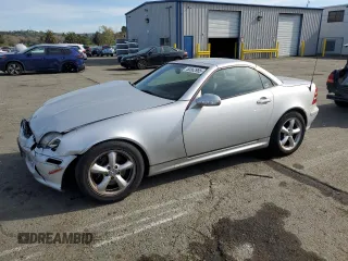 2002 Mercedes-Benz SLK-Class 3.2L with VIN WDBKK65F22F253077, listed as a Copart auction lot 50562985 with 152,195 mi miles and Salvage Title. Bid and sale history available at carsss.com. Image 1.