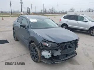 2023 Mazda CX-30 S Carbon Edition with VIN 3MVDMBCM0PM532449, listed as a IAAI auction lot 41799255 with 60,604 mi miles and . Bid and sale history available at DreamBid. Image 6.