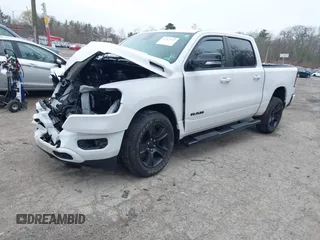 2021 Ram 1500 Big Horn with VIN 1C6SRFFT1MN721561, listed as a IAAI auction lot 42017023 with 62,023 mi miles and . Bid and sale history available at DreamBid. Image 2.