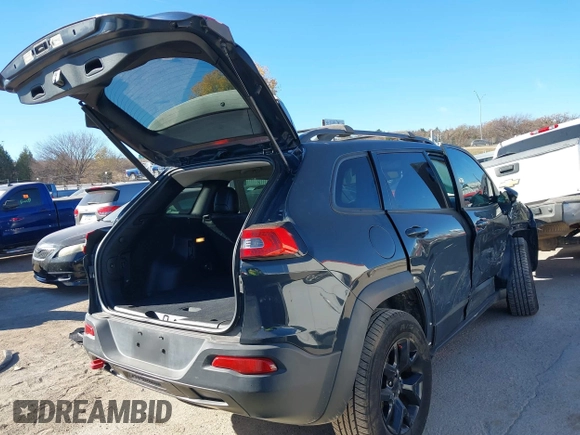 2017 Jeep Cherokee Trailhawk L Plus with VIN 1C4PJMBBXHW634944, listed as a IAAI auction lot 41022673 with 116,542 mi miles. Bid and sale history available at carsss.com. Image 4.