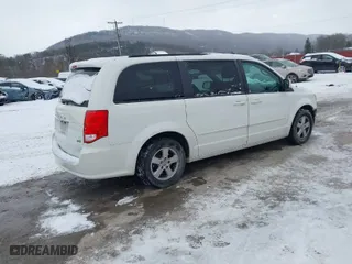 2011 Dodge Grand Caravan Mainstreet with VIN 2D4RN3DG7BR690603, listed as a IAAI auction lot 41271656 with 131,851 mi miles. Bid and sale history available at carsss.com. Image 4.