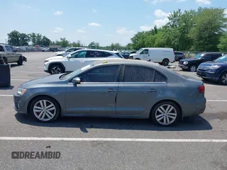 2014 Volkswagen Jetta GLI Autobahn with VIN 3VW5T7AJ6EM201416, listed as a IAAI auction lot 42684207 with 164,905 mi miles and . Bid and sale history available at DreamBid. Image 14.