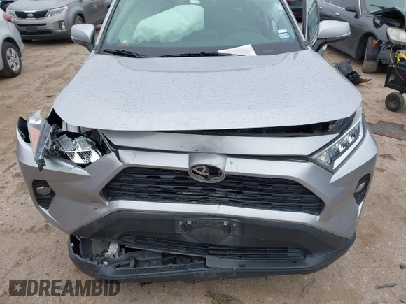 2021 Toyota RAV4 XLE with VIN 2T3W1RFVXMC148125, listed as a IAAI auction lot 41645741 with 66,047 mi miles. Bid and sale history available at carsss.com. Image 6.