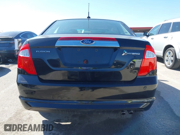 2010 Ford Fusion Hybrid z VIN 3FADP0L39AR396746, wystawiony jako IAAI lot #41764282 z przebiegiem 132 582 mil mil oraz . Historia ofert i sprzedaży dostępna na DreamBid. Obrazek 16.