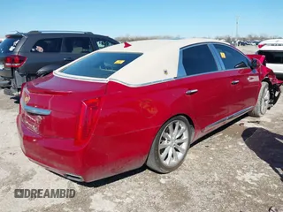 2014 Cadillac XTS Luxury with VIN 2G61M5S35E9297781, listed as a IAAI auction lot 41765330 with 149,770 mi miles and . Bid and sale history available at DreamBid. Image 4.