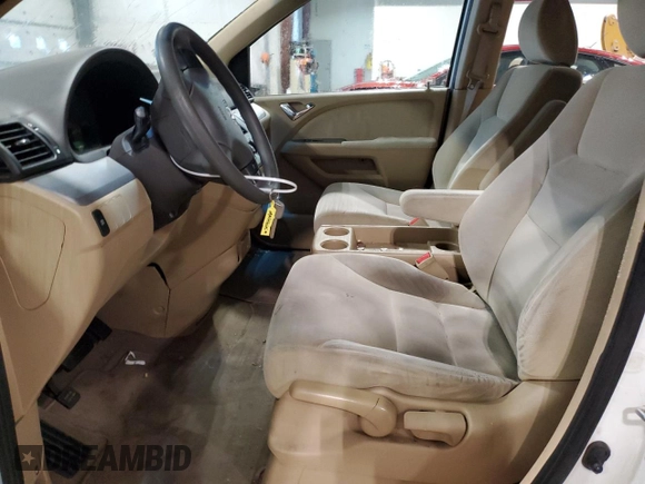 2010 Honda Odyssey LX z VIN 5FNRL3H2XAB110286, wystawiony jako Copart lot #46936125 z przebiegiem 127 979 mil mil oraz Czysty tytuł • Clean title. Historia ofert i sprzedaży dostępna na DreamBid. Obrazek 7.