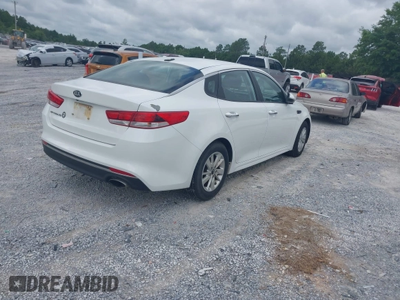 2017 Kia Optima LX z VIN 5XXGT4L32HG161091, wystawiony jako IAAI lot #42266149 z przebiegiem 166 254 mil mil oraz . Historia ofert i sprzedaży dostępna na DreamBid. Obrazek 4.