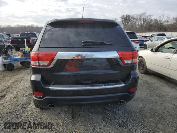 2013 Jeep Grand Cherokee Overland with VIN 1C4RJECT6DC655355, listed as a Copart auction lot 85654554 with 135,343 mi miles and Salvage Title. Bid and sale history available at carsss.com. Image 6.
