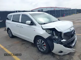 2015 Kia Sedona EX with VIN KNDMC5C1XF6019297, listed as a IAAI auction lot 42035941 with 113,645 mi miles and . Bid and sale history available at DreamBid. Image 1.
