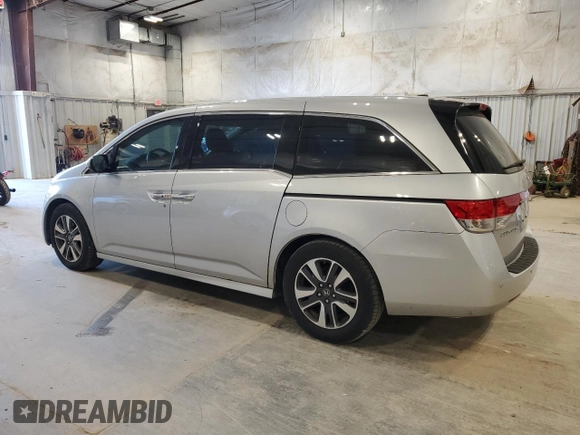2014 Honda Odyssey Touring with VIN 5FNRL5H97EB005977, listed as a Copart auction lot 53849025 with 229,915 mi miles and Non Repairable. Bid and sale history available at DreamBid. Image 2.