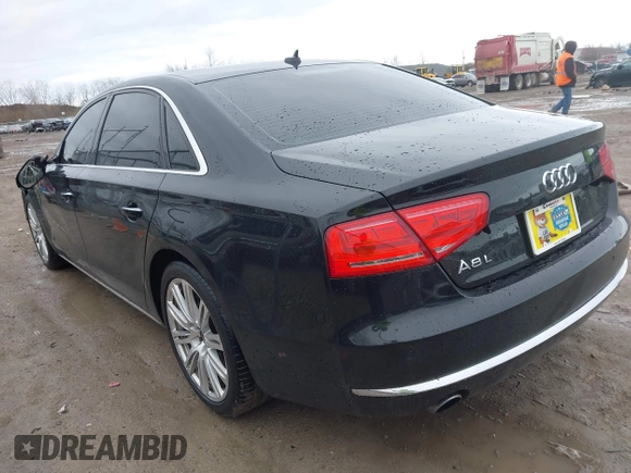 2014 Audi A8 3.0T z VIN WAURGAFD5EN004118, wystawiony jako IAAI lot #41919506 z przebiegiem 182 382 mil mil oraz . Historia ofert i sprzedaży dostępna na DreamBid. Obrazek 3.