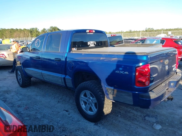 2010 Dodge Dakota Bighorn/Lonestar with VIN 1D7CW3GP5AS130870, listed as a IAAI auction lot 40929651 with 128,077 mi miles. Bid and sale history available at carsss.com. Image 13.