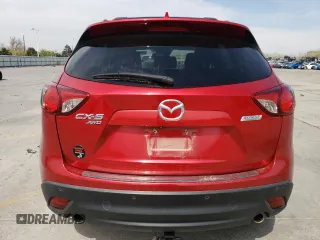 2015 Mazda CX-5 Grand Touring with VIN JM3KE4DY3F0441896, listed as a Copart auction lot 54210025 with 170,308 mi miles and Clean Title. Bid and sale history available at carsss.com. Image 6.
