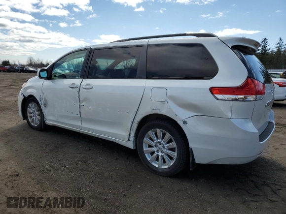 2012 Toyota Sienna XLE with VIN 5TDDK3DCXCS047104, listed as a Copart auction lot 53521335 with 184,269 mi miles and Clean Title. Bid and sale history available at DreamBid. Image 2.