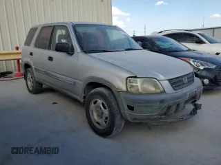 1999 Honda CR-V LX with VIN JHLRD2848XC011581, listed as a Copart auction lot 77183294 with 218,474 mi miles and Salvage Title. Bid and sale history available at carsss.com. Image 4.