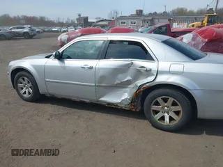 2007 Chrysler 300 Touring with VIN 2C3KA53G17H798756, listed as a IAAI auction lot 42065978 with 204,388 mi miles and . Bid and sale history available at carsss.com. Image 6.