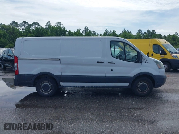 2016 Ford Transit Cargo with VIN 1FTYE1YMXGKB08593, listed as a IAAI auction lot 42347910 with 206,109 mi miles and . Bid and sale history available at DreamBid. Image 13.