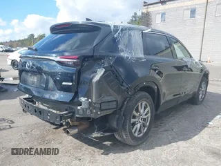 2019 Mazda CX-9 Touring z VIN JM3TCBCY0K0317028, wystawiony jako IAAI lot #41814713 z przebiegiem 155 280 mil mil oraz . Historia ofert i sprzedaży dostępna na DreamBid. Obrazek 4.