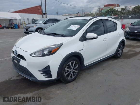 2018 Toyota Prius One with VIN JTDKDTB32J1599677, listed as a IAAI auction lot 42041923 with 83,384 mi miles and . Bid and sale history available at DreamBid. Image 2.