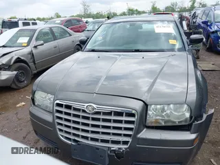 2009 Chrysler 300 LX with VIN 2C3KA43D49H558006, listed as a IAAI auction lot 42178195 with 208,864 mi miles and . Bid and sale history available at carsss.com. Image 13.