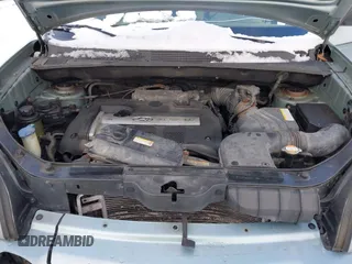 2006 Hyundai Tucson GL with VIN KM8JM72B06U298904, listed as a IAAI auction lot 41370728 with 209,284 mi miles. Bid and sale history available at carsss.com. Image 10.