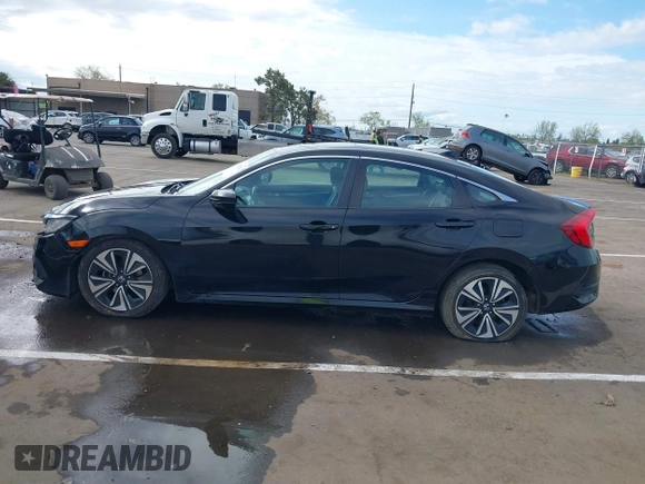 2016 Honda Civic Sedan EX-L with VIN 19XFC1F78GE201822, listed as a IAAI auction lot 41882529 with 142,589 mi miles. Bid and sale history available at carsss.com. Image 14.