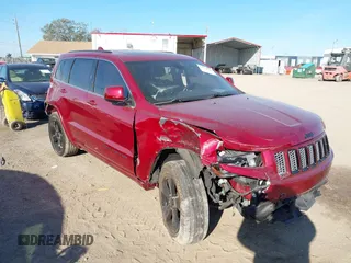 2014 Jeep Grand Cherokee Laredo with VIN 1C4RJEAG3EC519708, listed as a IAAI auction lot 41616364 with 131,184 mi miles. Bid and sale history available at carsss.com. Image 1.