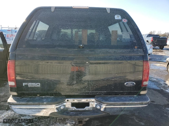 1999 Ford Super Duty F-250 XL with VIN 1FTNX21L7XED97757, listed as a Copart auction lot 42296985 with 168,728 mi miles and Salvage Title. Bid and sale history available at carsss.com. Image 6.