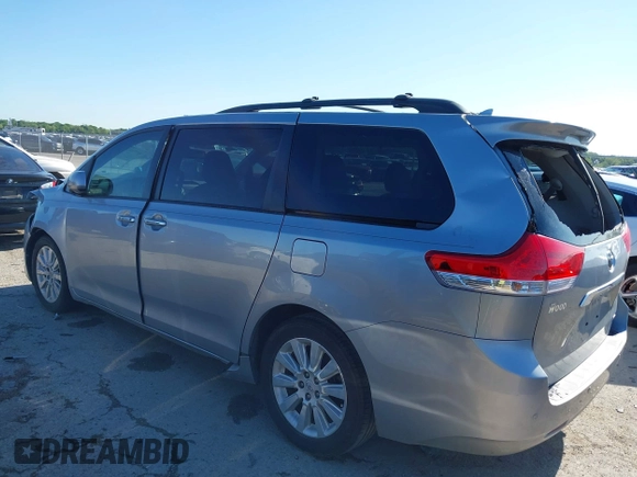 2011 Toyota Sienna XLE AAS with VIN 5TDYK3DC0BS056197, listed as a IAAI auction lot 41771073 with 195,022 mi miles and . Bid and sale history available at DreamBid. Image 3.