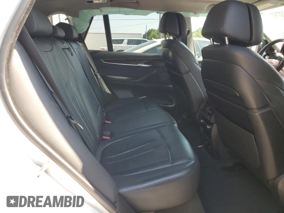 2016 BMW X5 xDrive35i z VIN 5UXKR0C59G0S93508, wystawiony jako Copart lot #55920795 z przebiegiem 127 416 mil mil oraz Szkoda całkowita • Salvage title. Historia ofert i sprzedaży dostępna na DreamBid. Obrazek 11.