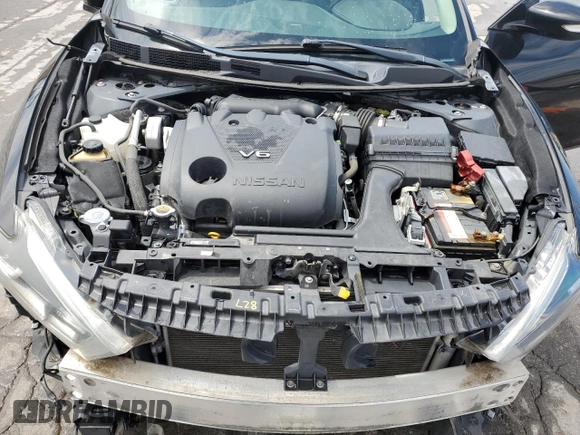 2017 Nissan Maxima SL with VIN 1N4AA6AP4HC424958, listed as a Copart auction lot 57298725 with 127,485 mi miles and Salvage title. Bid and sale history available at DreamBid. Image 11.