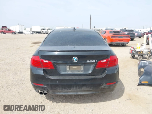 2015 BMW 5 Series 528i with VIN WBA5A5C58FD520694, listed as a IAAI auction lot 41804906 with 121,636 mi miles. Bid and sale history available at carsss.com. Image 17.
