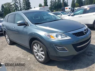 2010 Mazda CX-9 Touring z VIN JM3TB3MV5A0220905, wystawiony jako IAAI lot #42566018 z przebiegiem 158 152 mil mil oraz . Historia ofert i sprzedaży dostępna na DreamBid. Obrazek 1.