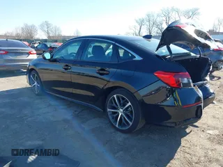 2023 Honda Civic Sedan Touring with VIN 2HGFE1F92PH311721, listed as a IAAI auction lot 41760477 with 15,244 mi miles. Bid and sale history available at carsss.com. Image 3.