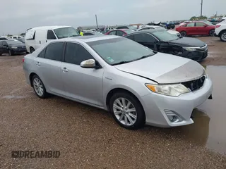 2012 Toyota Camry XLE z VIN 4T1BD1FK5CU044693, wystawiony jako IAAI lot #42355357 z przebiegiem 217 394 mil mil oraz . Historia ofert i sprzedaży dostępna na DreamBid. Obrazek 1.