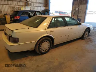 1993 Cadillac Seville Touring STS z VIN 1G6KY5295PU817593, wystawiony jako Copart lot #47807075 z przebiegiem Nie podano mil oraz Czysty tytuł • Clean title. Historia ofert i sprzedaży dostępna na DreamBid. Obrazek 3.