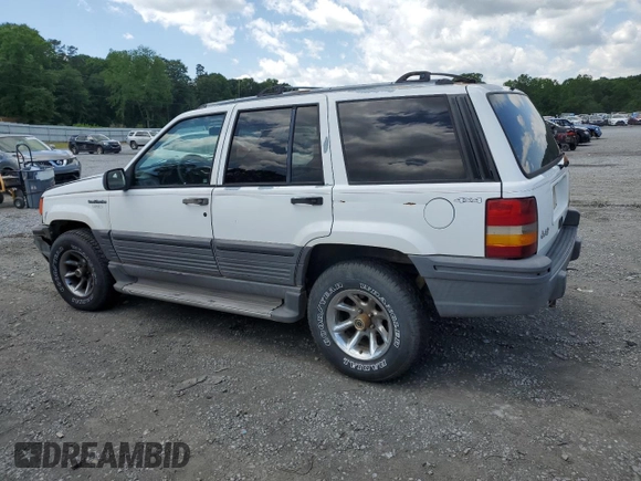 1995 Jeep Grand Cherokee Laredo с VIN 1J4GZ58S5SC724222, выставлен на аукционе Copart как лот 57837155 с пробегом 246 303 миль миль и Списание • Salvage title. История ставок и продаж доступна на DreamBid. Изображение 2.