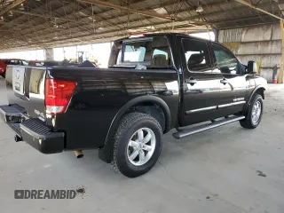 2011 Nissan Titan Pro-4X z VIN 1N6BA0EC9BN304469, wystawiony jako Copart lot #52982815 z przebiegiem 108 829 mil mil oraz Szkoda całkowita • Salvage title. Historia ofert i sprzedaży dostępna na DreamBid. Obrazek 3.