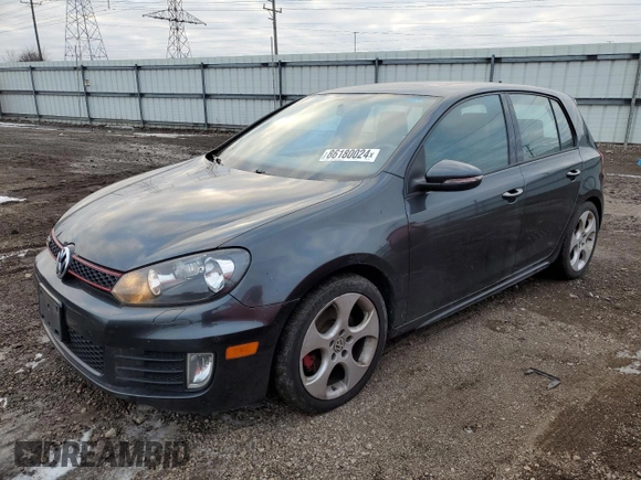 2010 Volkswagen GTI with VIN WVWHV7AJ2AW400192, listed as a Copart auction lot 86180024 with 124,705 mi miles and Salvage Title. Bid and sale history available at carsss.com. Image 1.