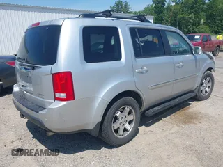 2010 Honda Pilot Touring z VIN 5FNYF4H94AB010058, wystawiony jako IAAI lot #42495313 z przebiegiem 157 306 mil mil oraz . Historia ofert i sprzedaży dostępna na DreamBid. Obrazek 4.