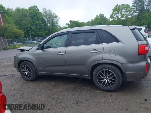 2014 Kia Sorento SX z VIN 5XYKWDA70EG478463, wystawiony jako IAAI lot #42251435 z przebiegiem 102 638 mil mil oraz . Historia ofert i sprzedaży dostępna na DreamBid. Obrazek 14.