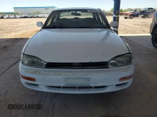 1994 Toyota Camry LE z VIN JT2GK12E4R0005313, wystawiony jako Copart lot #58034555 z przebiegiem 182 221 mil mil oraz Szkoda całkowita • Salvage title. Historia ofert i sprzedaży dostępna na DreamBid. Obrazek 5.