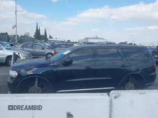 2019 Dodge Durango SXT Plus with VIN 1C4RDHAG1KC535197, listed as a IAAI auction lot 41324175 with 104,037 mi miles and . Bid and sale history available at DreamBid. Image 14.