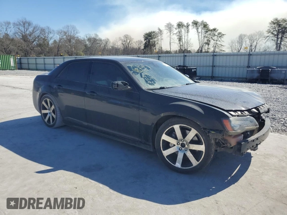 2012 Chrysler 300 SRT8 with VIN 2C3CCAFJ0CH801896, listed as a Copart auction lot 46991275 with 117,467 mi miles and Salvage Title. Bid and sale history available at carsss.com. Image 4.