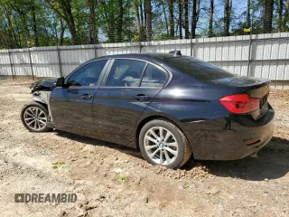 2017 BMW 3 Series 320i with VIN WBA8E1G5XHNU12983, listed as a Copart auction lot 50874454 with 68,434 mi miles and Salvage Title. Bid and sale history available at carsss.com. Image 2.