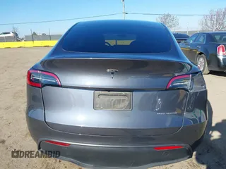 2023 Tesla Model Y Long Range with VIN 7SAYGAEE5PF964083, listed as a IAAI auction lot 41365919 with 26,008 mi miles and . Bid and sale history available at carsss.com. Image 17.