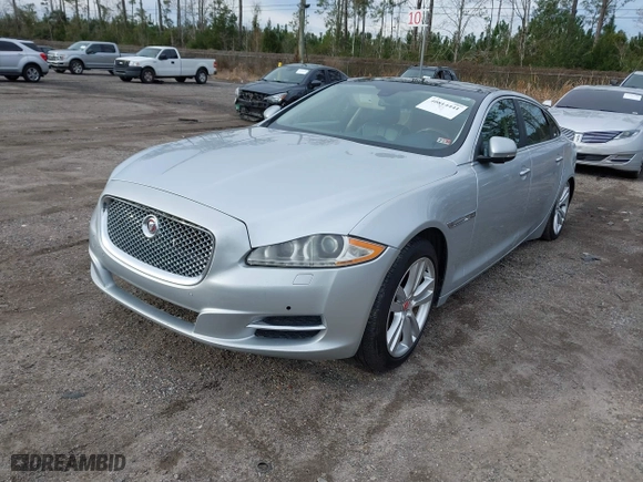 2014 Jaguar XJ with VIN SAJWA2GZ2E8V74309, listed as a IAAI auction lot 40814441 with 1 mi miles. Bid and sale history available at carsss.com. Image 16.