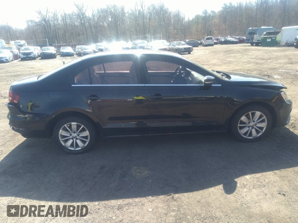2016 Volkswagen Jetta Sedan 1.4T SE with VIN 3VWD67AJXGM242539, listed as a IAAI auction lot 38948493 with 121,876 mi miles. Bid and sale history available at carsss.com. Image 13.