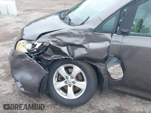 2014 Toyota Sienna LE AAS with VIN 5TDKK3DC9ES448461, listed as a IAAI auction lot 41986724 with 102,930 mi miles and . Bid and sale history available at carsss.com. Image 17.
